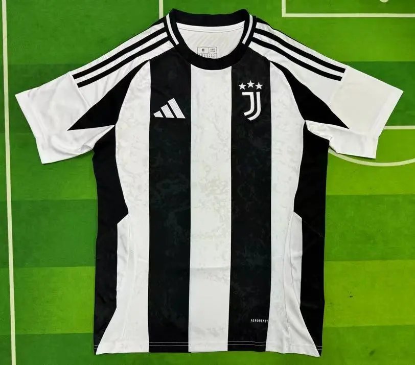 Black and white striped sports jersey on a green field background