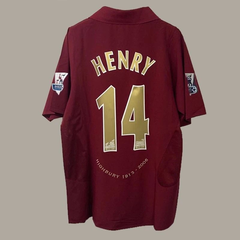 Maroon sports jersey with 'HENRY' and number '14' on a beige background