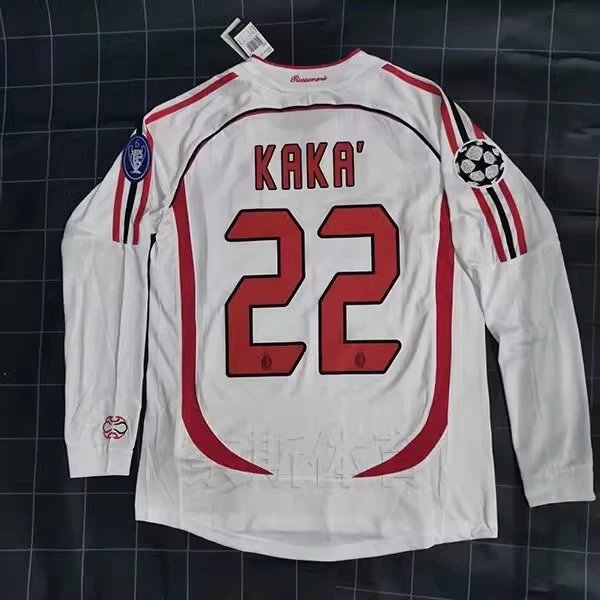 White sports jersey with red lettering and number on a checkered background