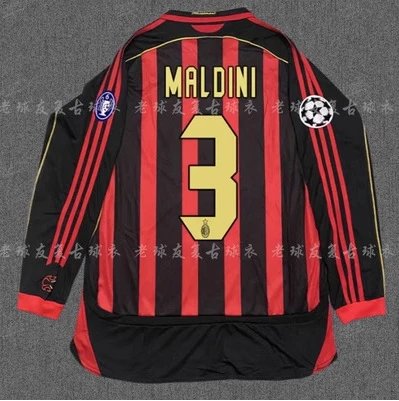 Black and red sports jersey with 'Maldini' and number '3' on a gray background