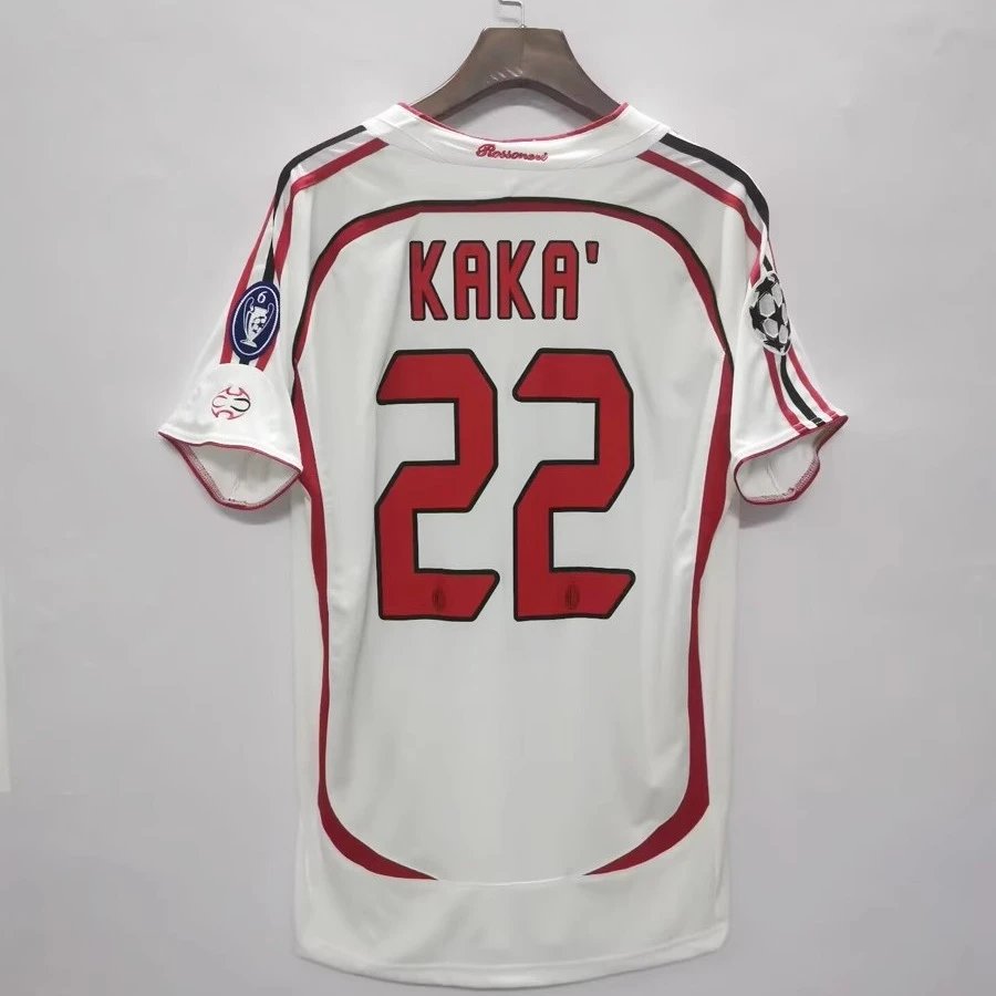 White sports jersey with red numbering and text, hanging on a gray background