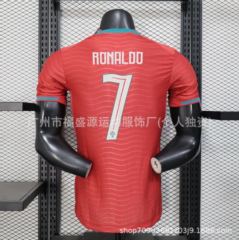 Red sports jersey with 'RONALDO' and number '7' on a mannequin against a grid background.