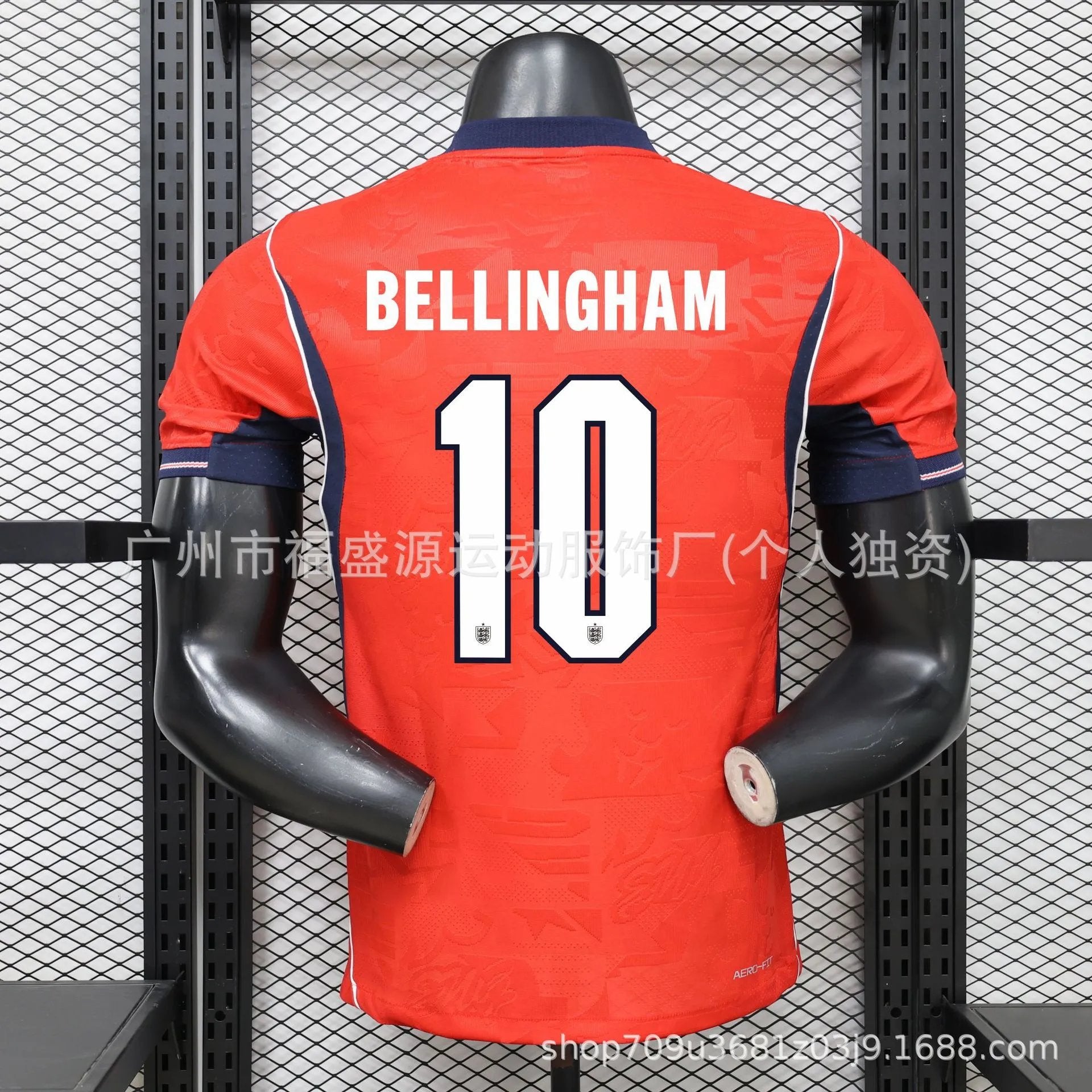 Red sports jersey with 'Bellingham' and number '10' on a mannequin against a grid background.