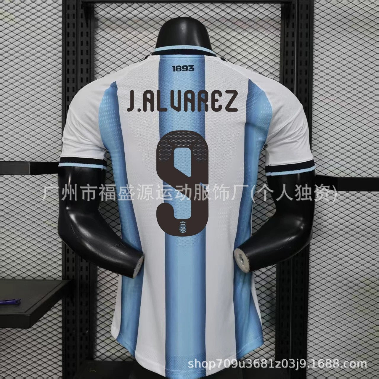 White and blue sports jersey with number 9 and name 'J. Alvarez' on a mannequin against a black mesh background.