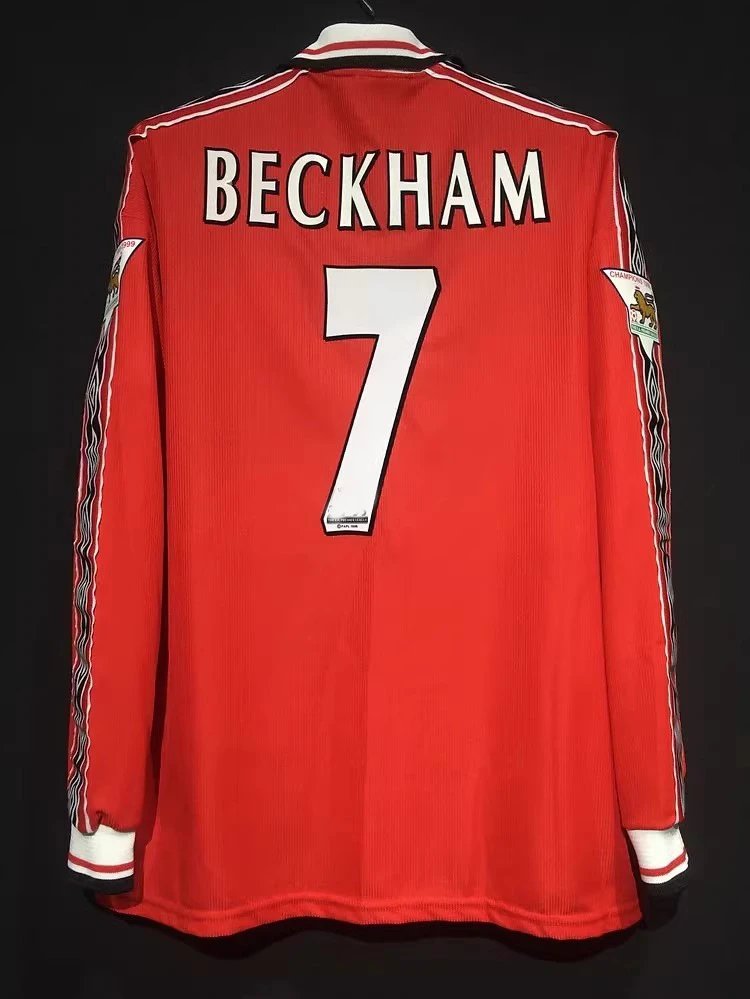 Red sports jersey with 'BECKHAM' and number '7' on a black background