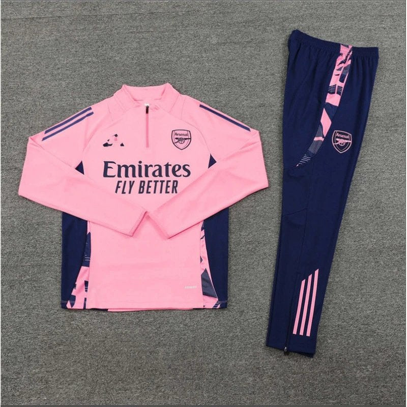 Pink and navy tracksuit with Adidas and Arsenal branding on a gray background