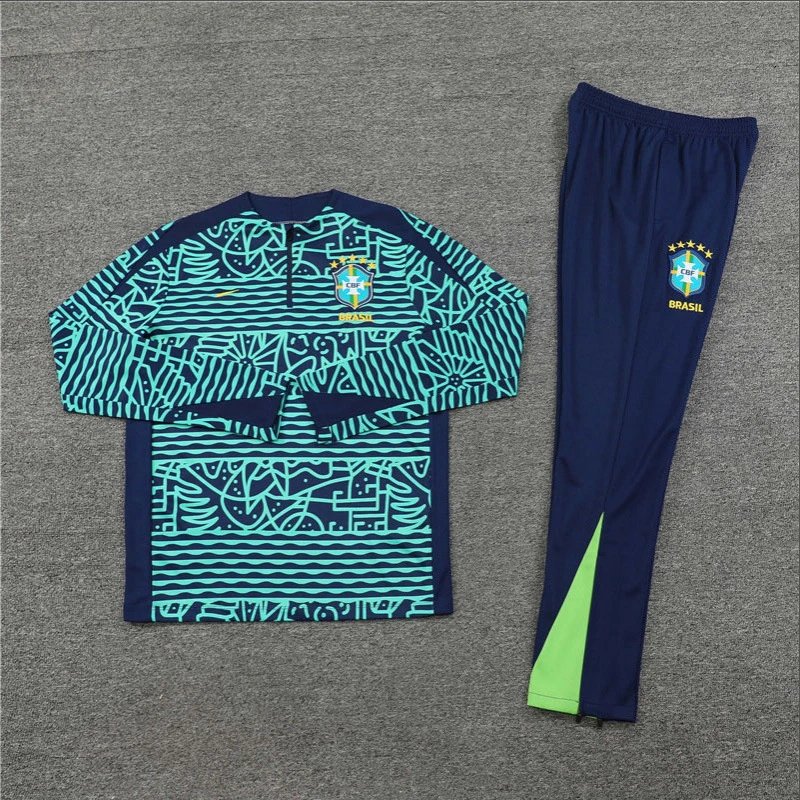 Navy and teal sports outfit with Brazilian flag design on a gray surface