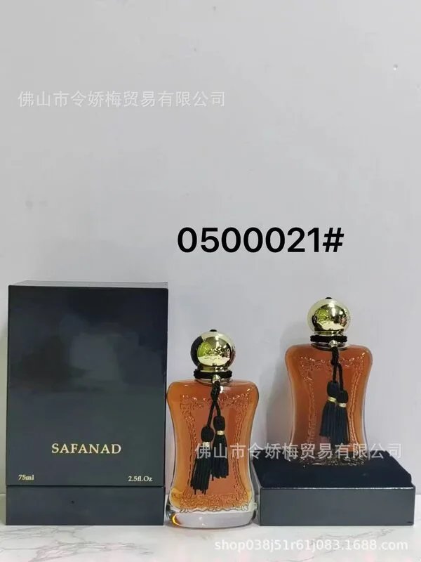 Two perfume bottles with a black box labeled 'SAFANAD' on a light gray background.