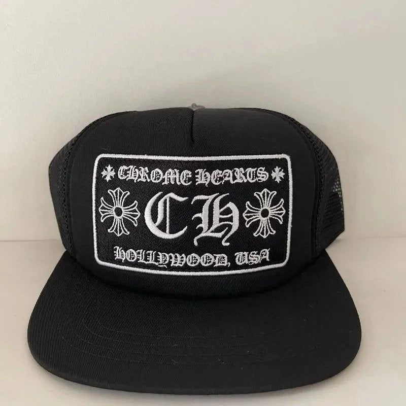 Black cap with white logo and text on a light gray background