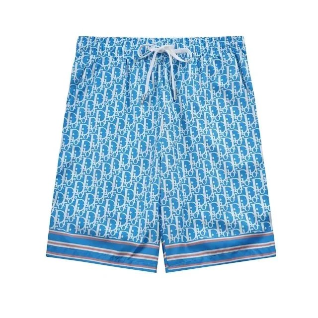 Blue swim shorts with a pattern on a white background