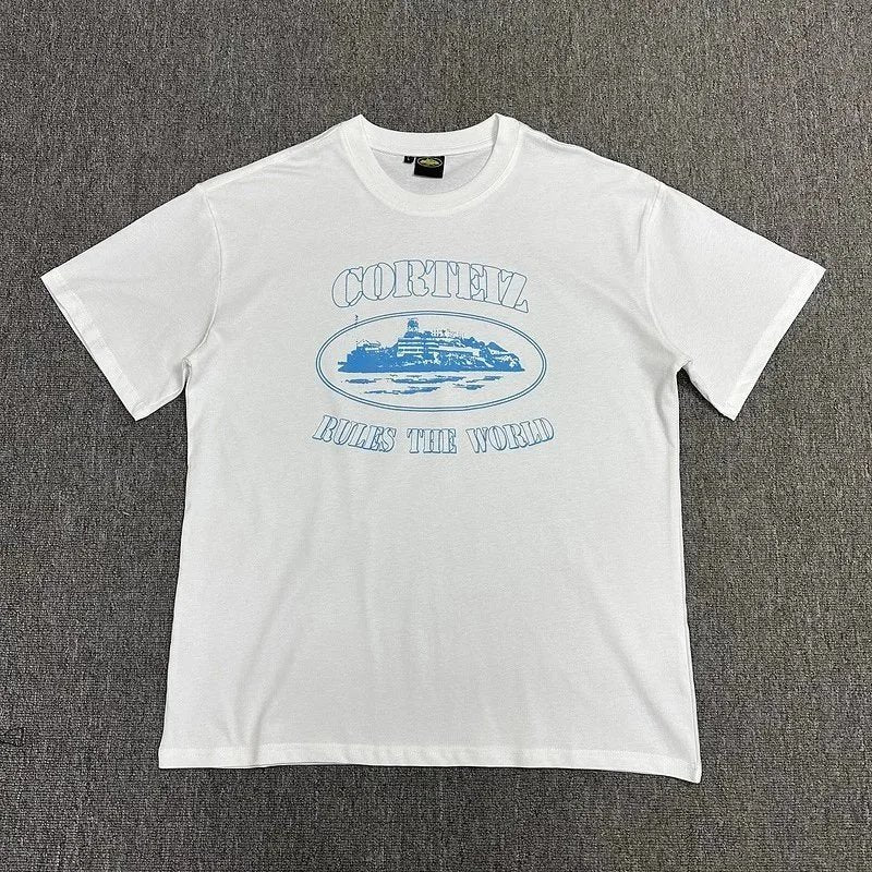 White t-shirt with blue graphic and text on a gray background