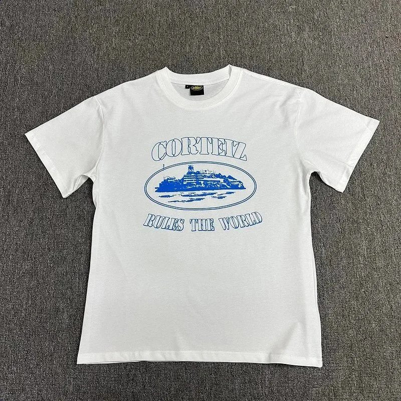 White t-shirt with blue graphics and text on a gray background