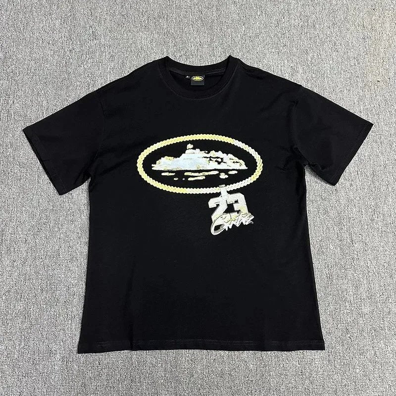 Black t-shirt with a graphic design on a gray background