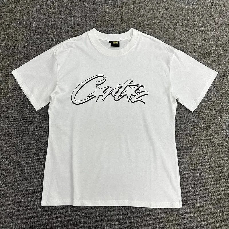 White t-shirt with black logo on a gray textured background