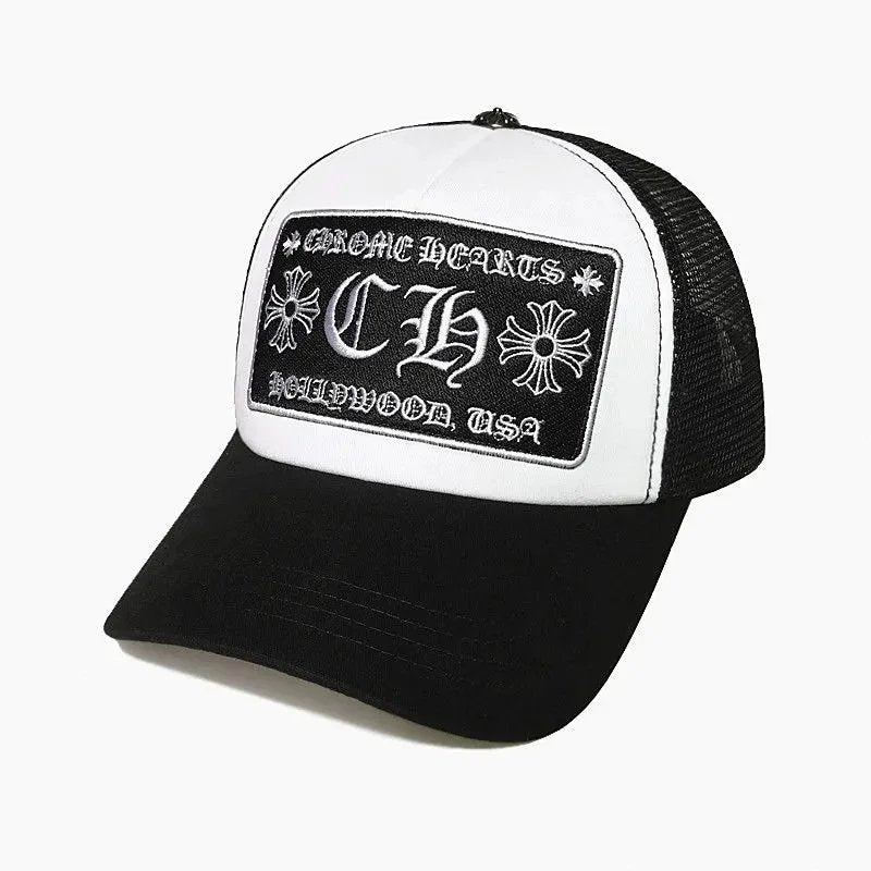 Black and white cap with 'Chrome Hearts' logo on a white background