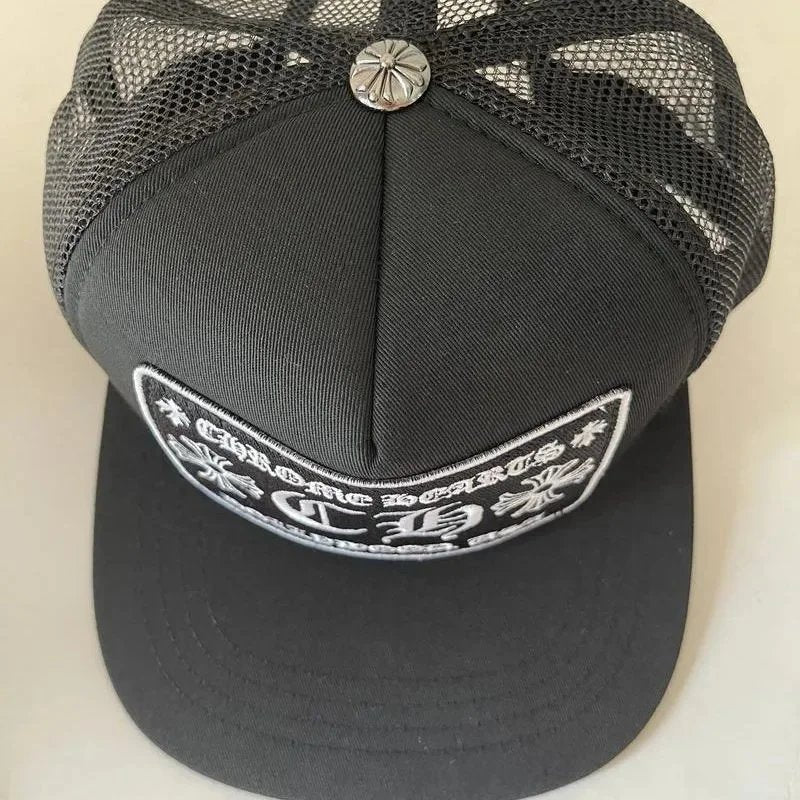 Black mesh cap with a logo on a beige background