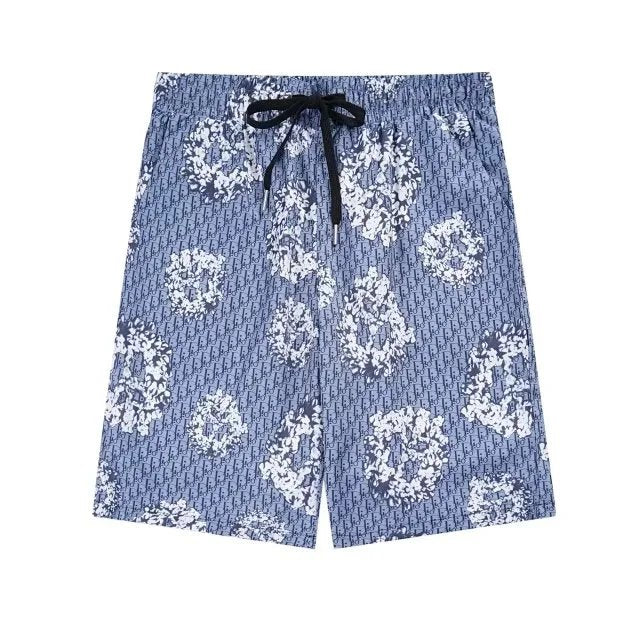 Blue shorts with white floral pattern on a white background