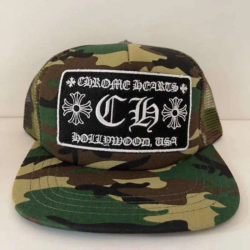 Camouflage cap with a black patch featuring 'CH' on a white background