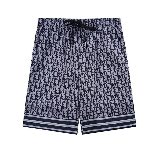Navy blue shorts with a pattern on a white background