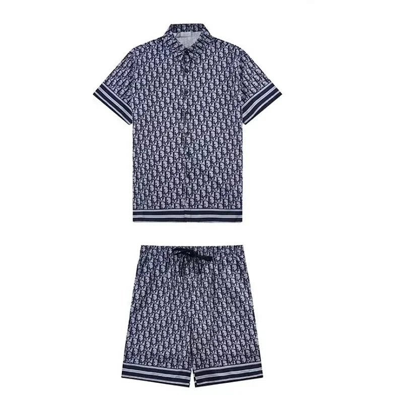 Navy patterned shirt and shorts set on a white background