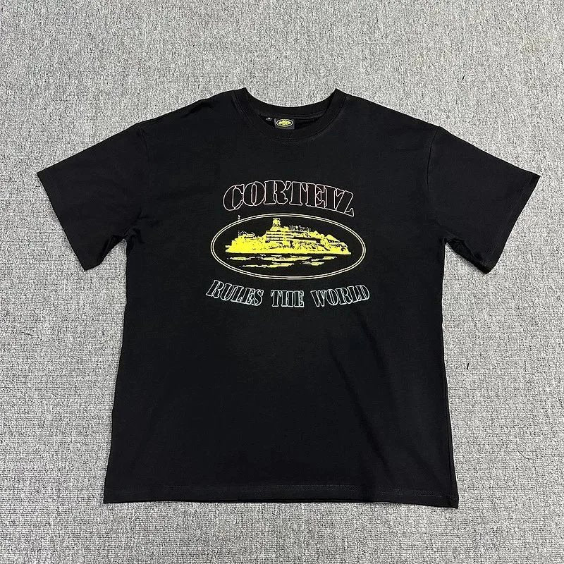 Black t-shirt with yellow graphic design on a gray background