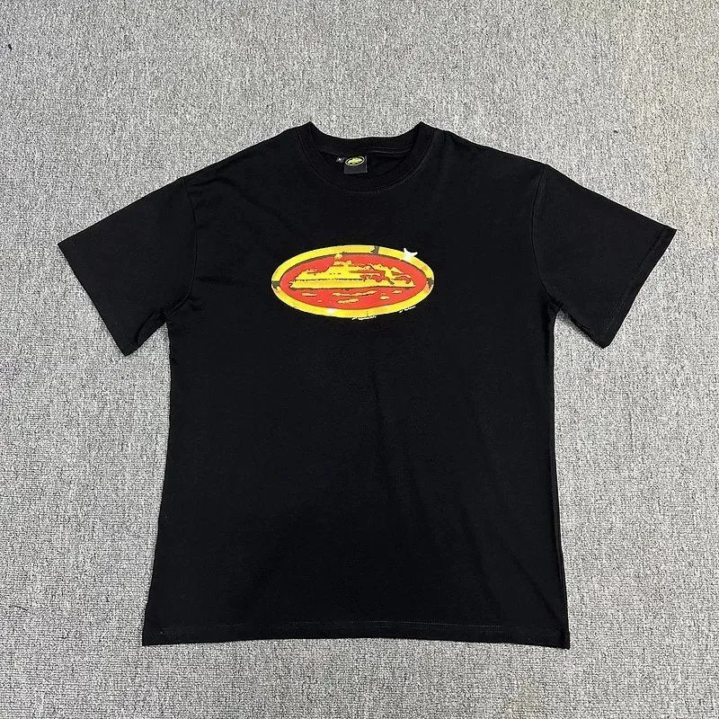 Black t-shirt with a yellow and red logo on a gray textured background