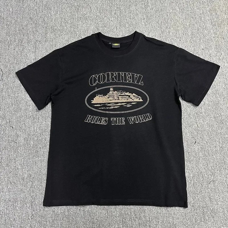Black t-shirt with graphic design and text on a gray background