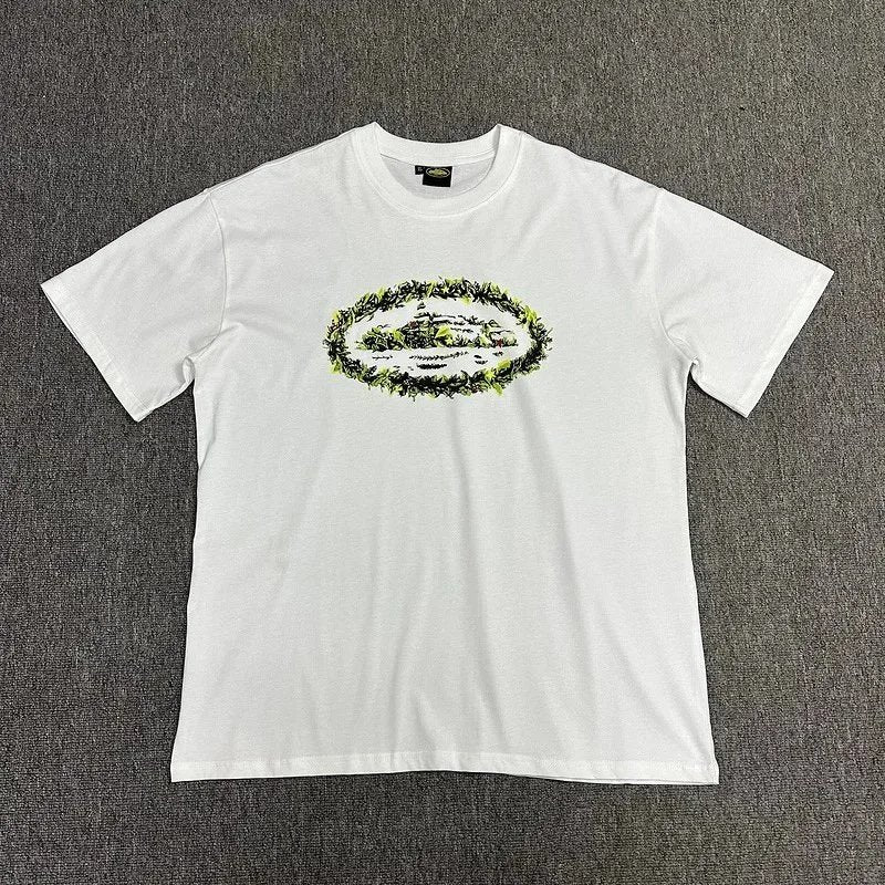 White t-shirt with a green logo on a gray background