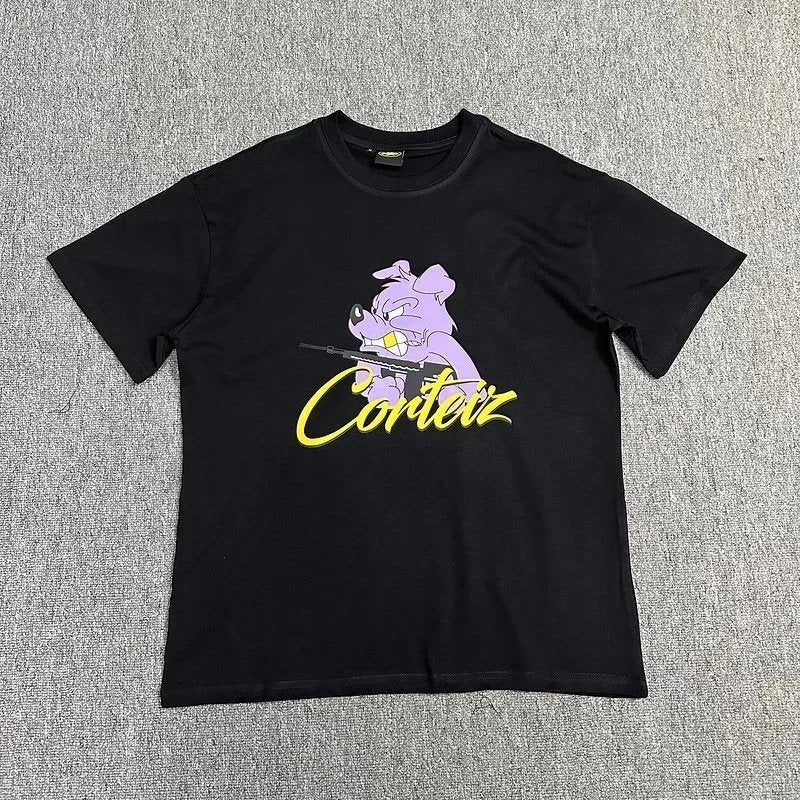Black t-shirt with a graphic design and text on a gray textured background