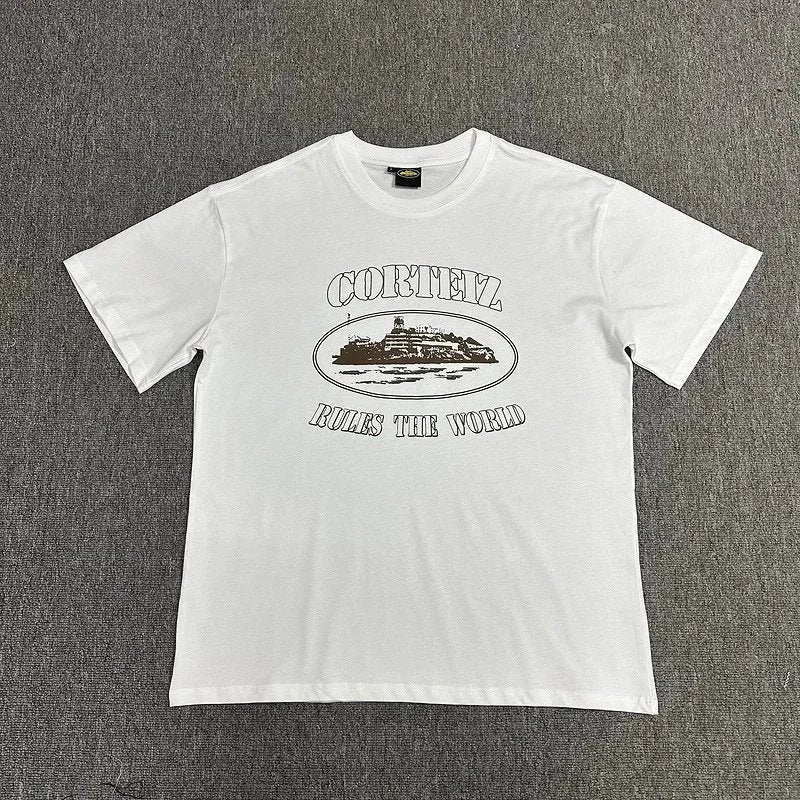 White t-shirt with black graphic design on a gray background