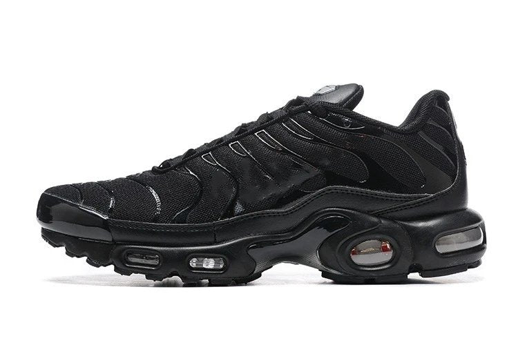 Black sneaker with a prominent air unit on a white background