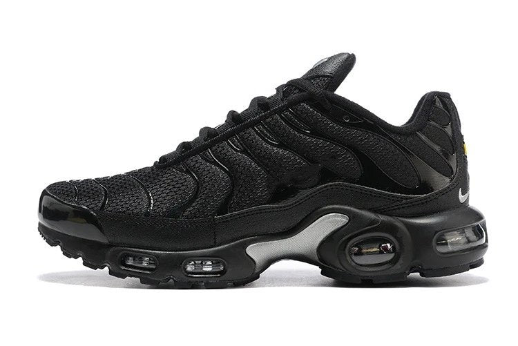 Black Nike sneaker with a white logo on a white background