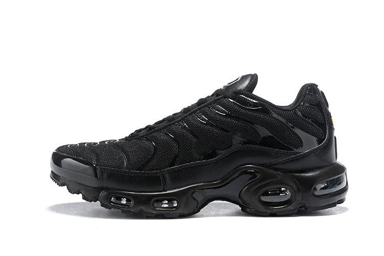 Black sneaker with air cushion sole on a white background