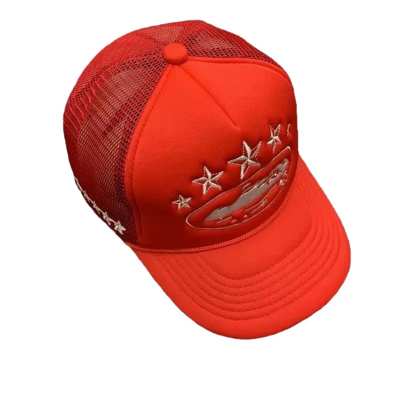 Red cap with star and eagle design on a white background