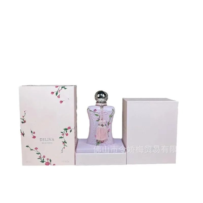 Perfume bottle with floral design packaging on a white background