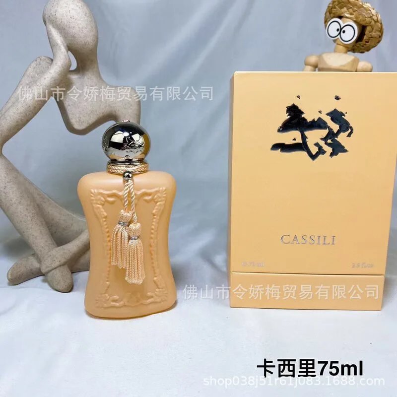 CASSILI perfume bottle and box on a gray background