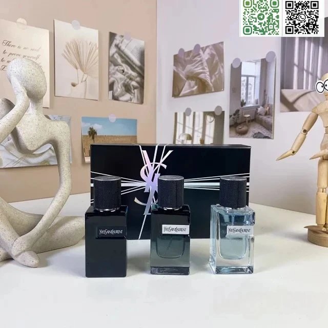 Three perfume bottles on a table with decorative items in the background