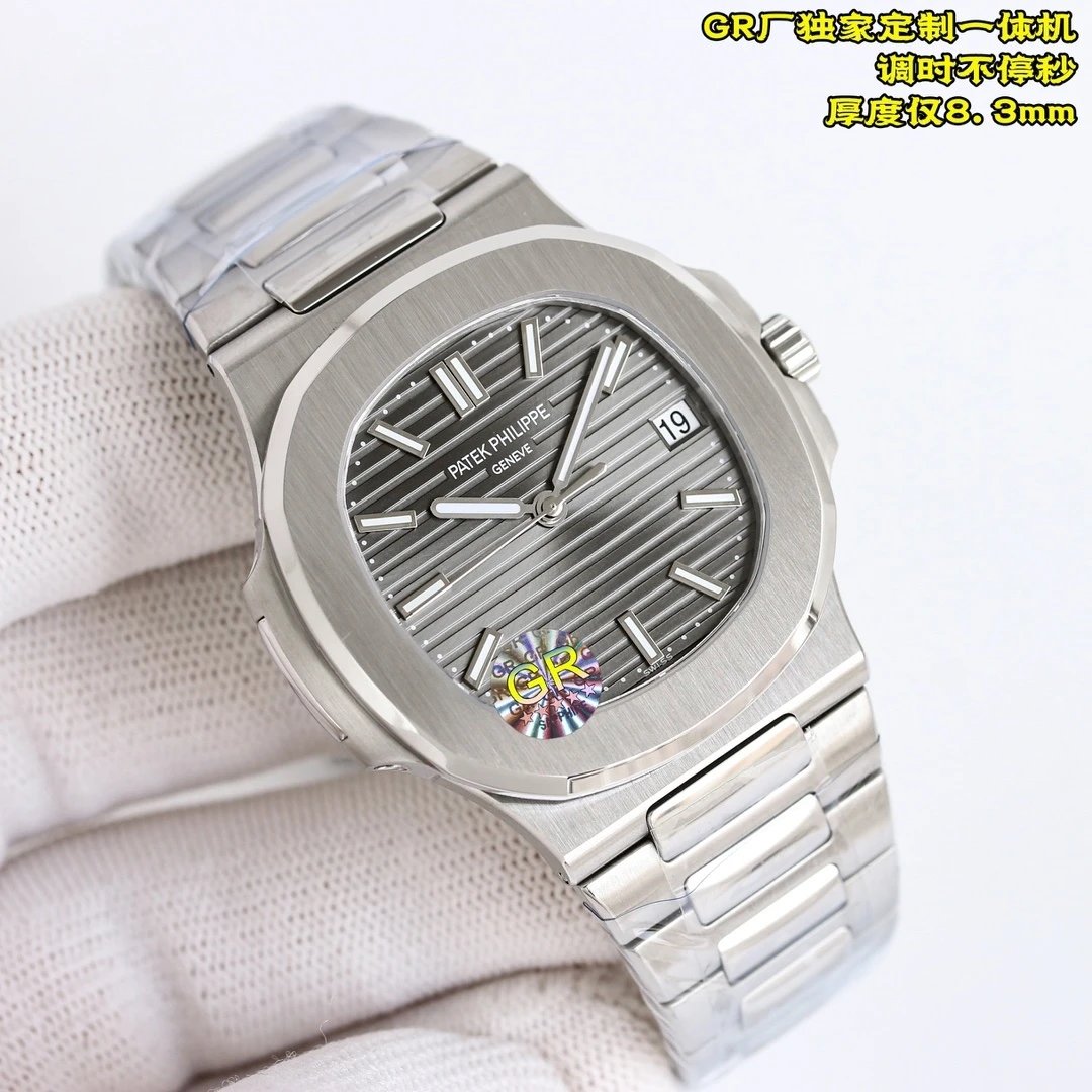 Silver watch with detailed face on a white background
