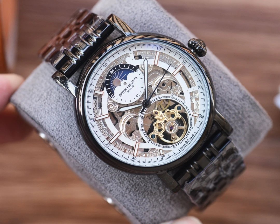 Luxury wristwatch with intricate design on a textured surface
