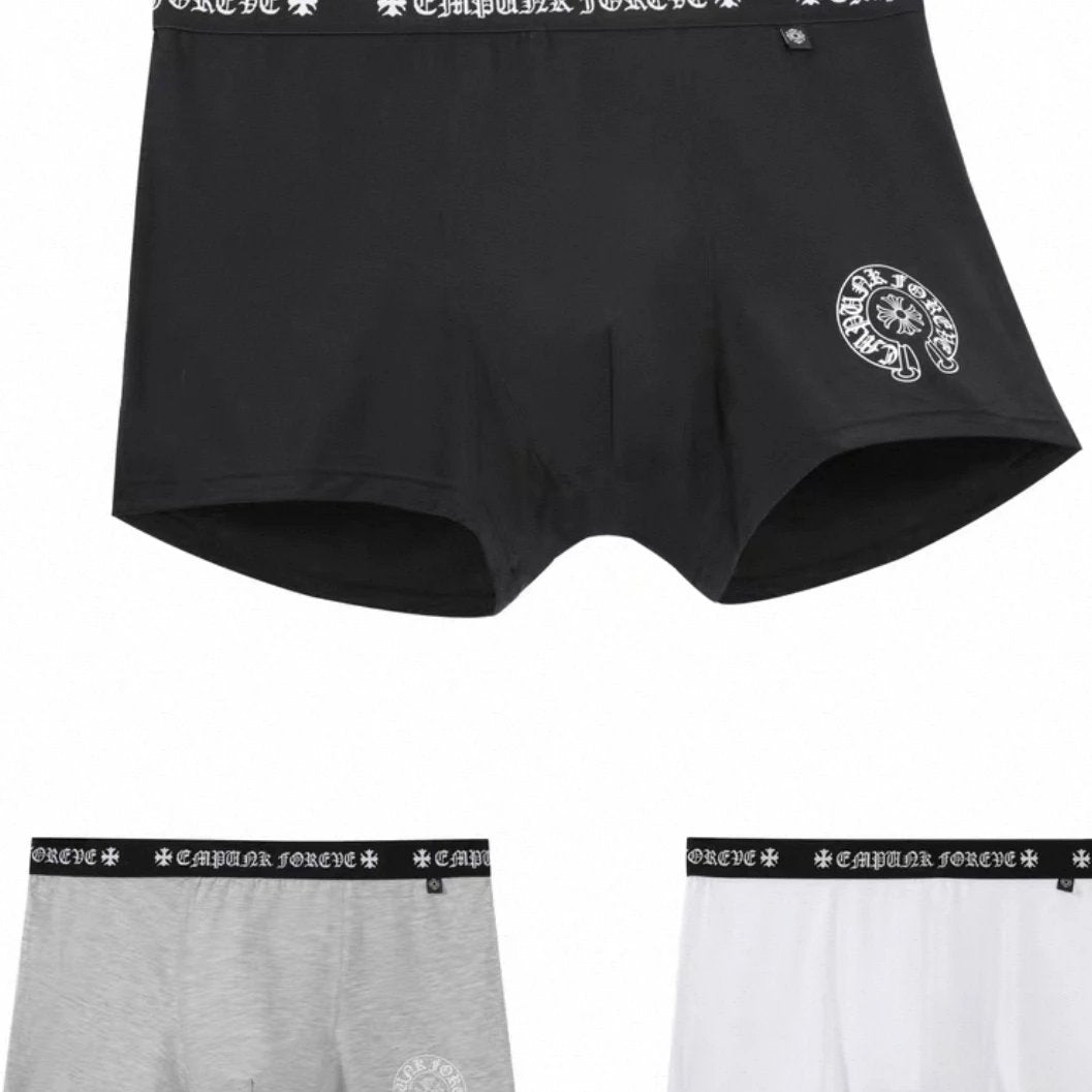 Three pairs of men's boxer briefs shown on a white background: one black pair at the top with a white circular logo on the lower right leg and white text on the waistband, plus two smaller pairs at the bottom in heather gray and white, both with black waistbands and the same white text pattern.