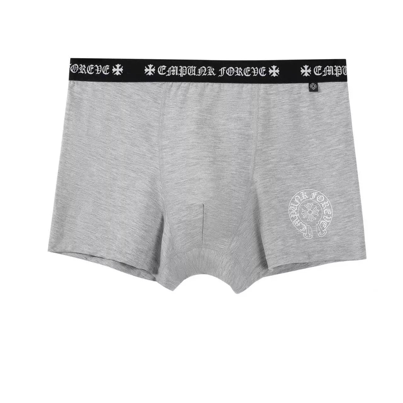 A pair of light gray heathered boxer briefs by Cadillac Force, featuring a black elastic waistband with white gothic lettering and a white circular logo printed on the lower left leg.