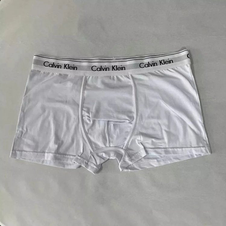 White Calvin Klein boxer briefs on a gray background