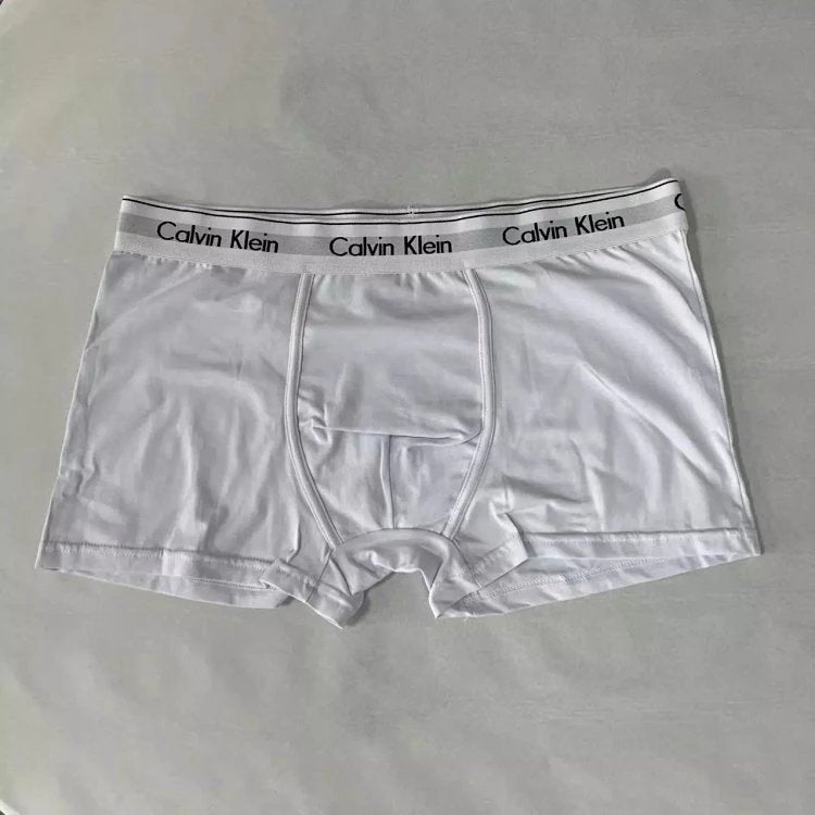 White Calvin Klein boxer briefs on a gray background