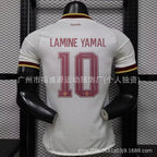 White sports jersey with 'Lamine Yamal' and number '10' on a black mannequin against a grid background.